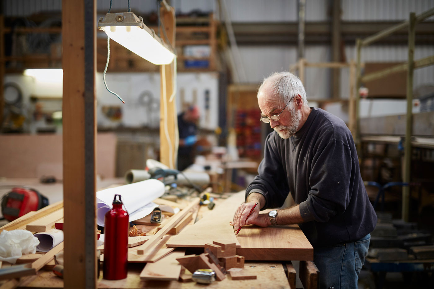 Senior man woodworking
