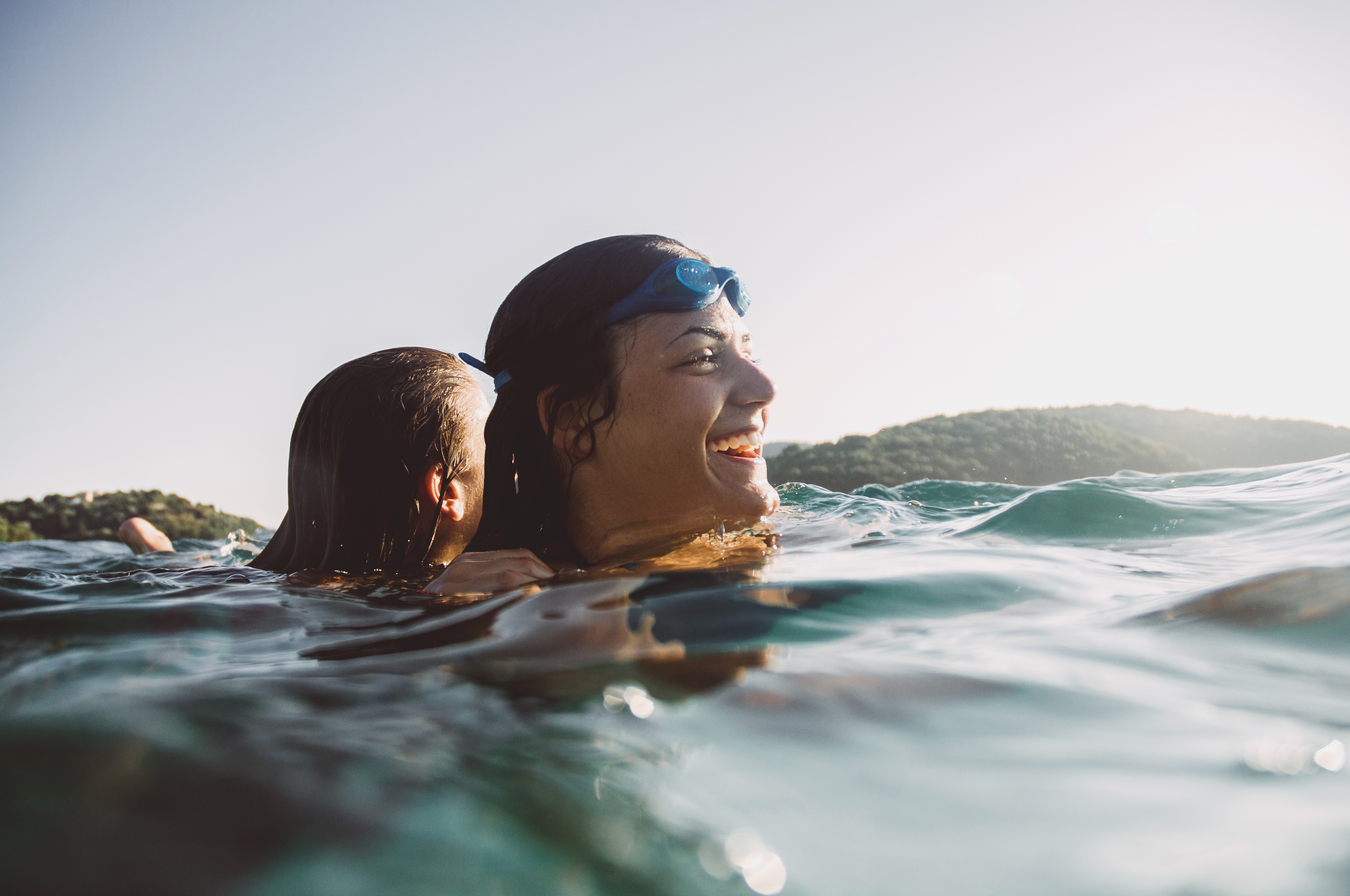 Woman swimming in the ocean