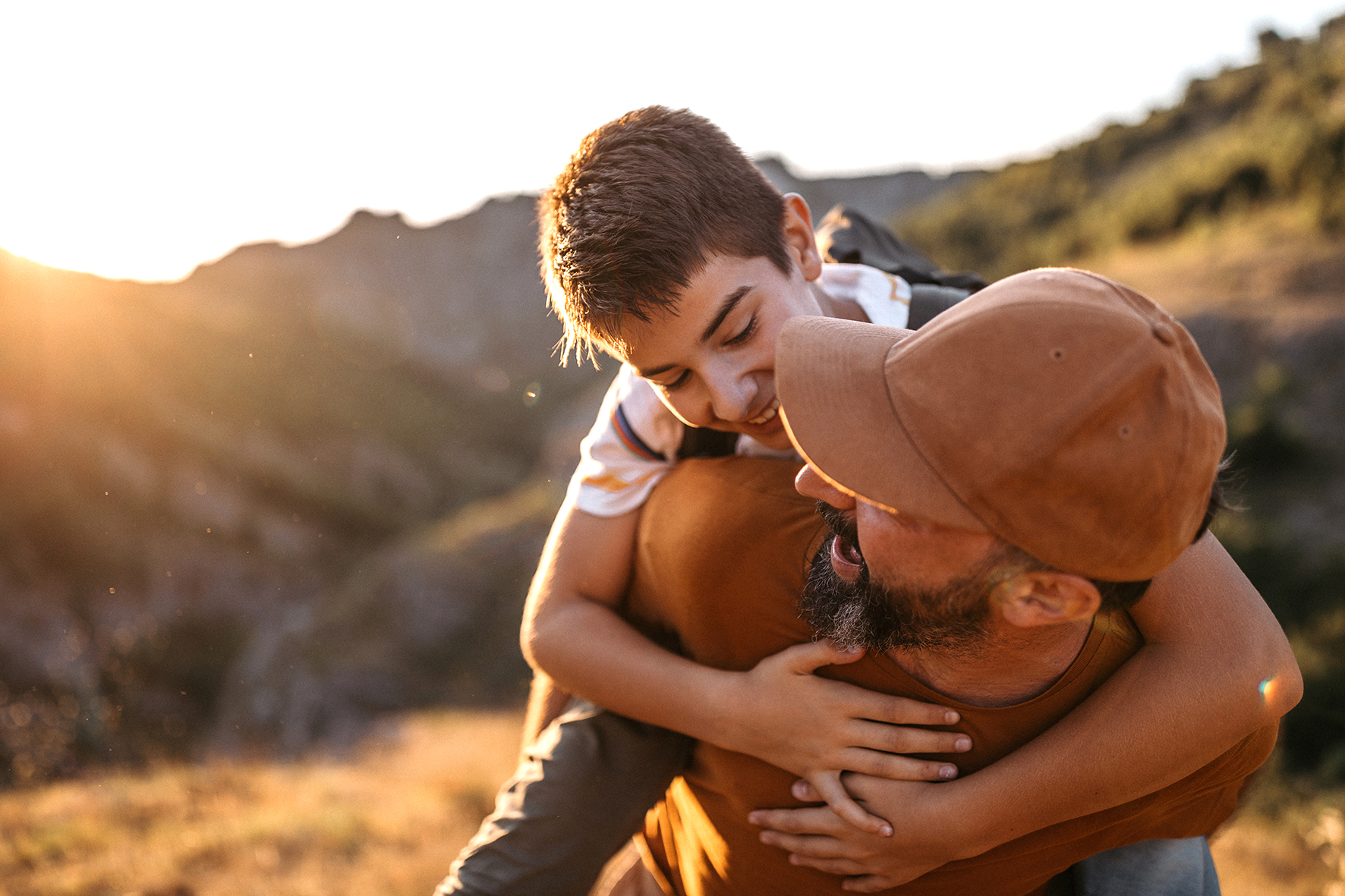 father and son at sunset